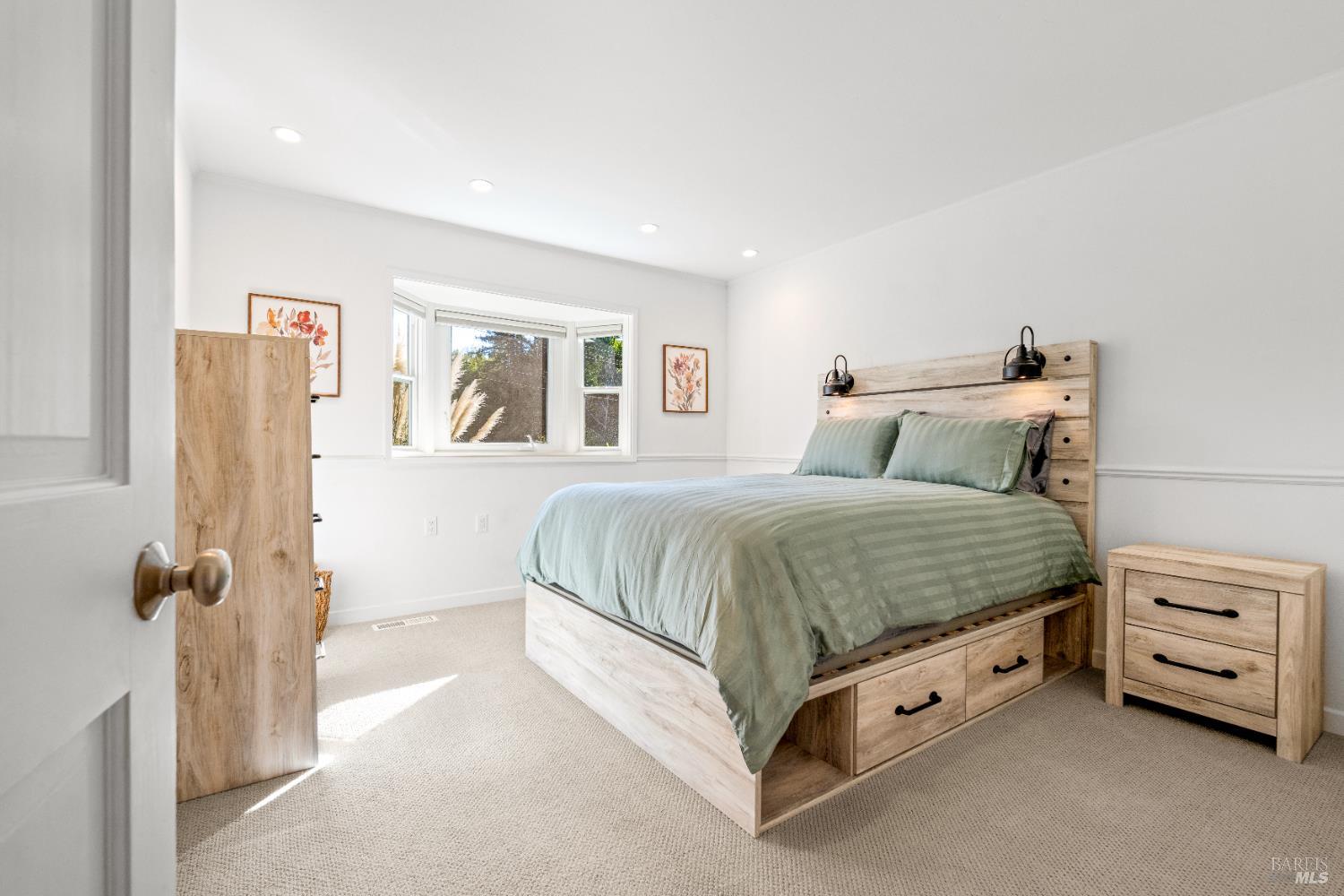 71 Convent Court San Rafael, CA 94901 - Photo 22 of 37 a spacious bedroom with a bed and a cabinets