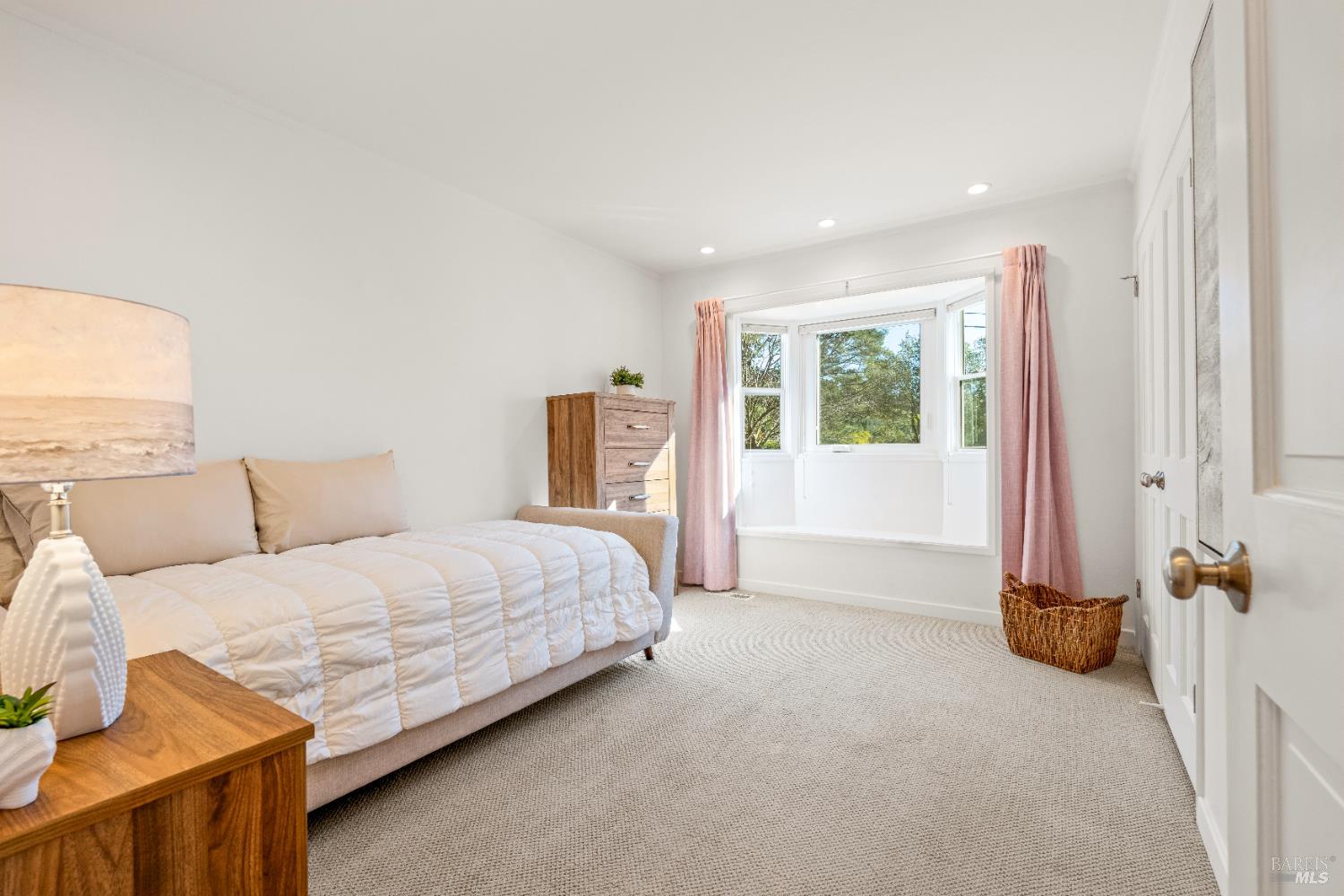 71 Convent Court San Rafael, CA 94901 - Photo 23 of 37 a spacious bedroom with a bed and a window
