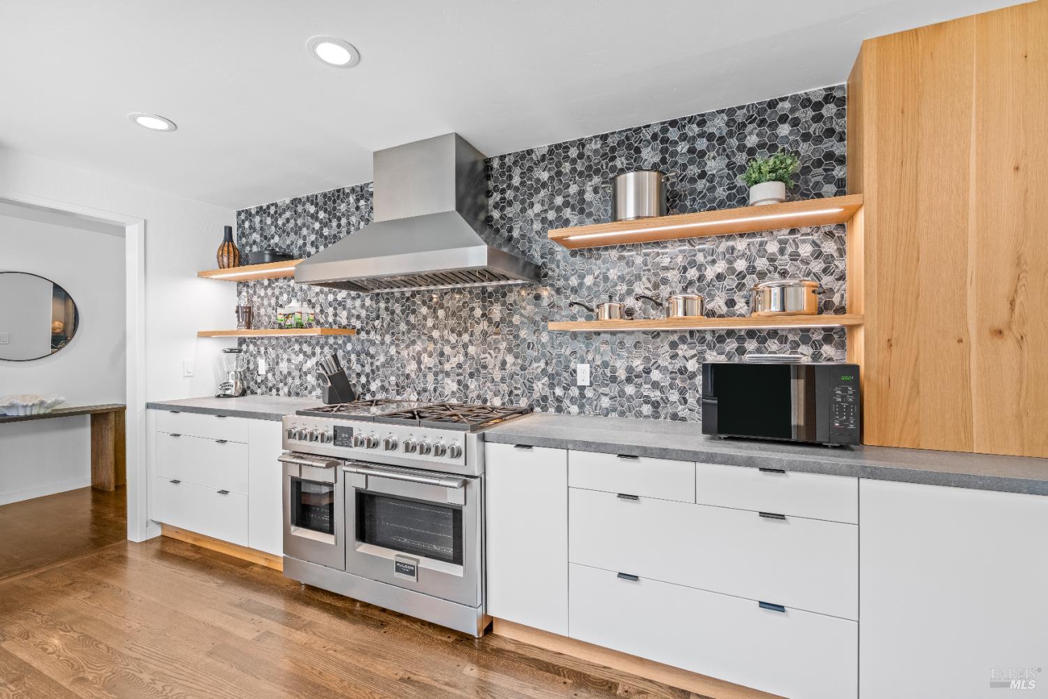 71 Convent Court San Rafael, CA 94901 - Photo 6 of 37 a kitchen with stainless steel appliances a stove and white cabinets