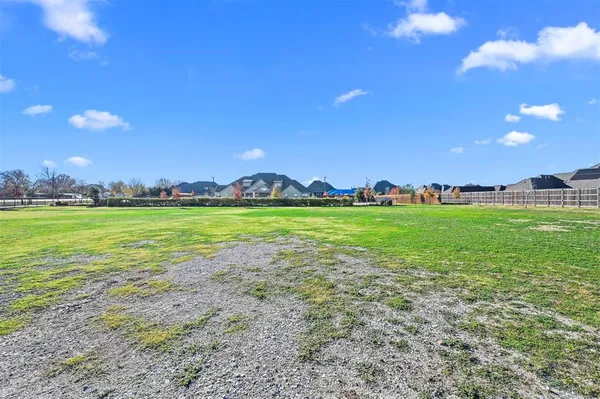 a view of a building and a yard