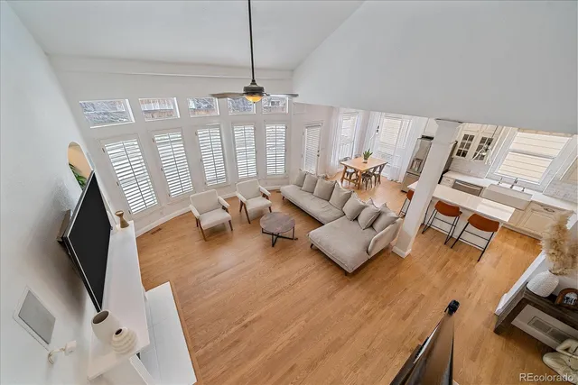 a living room with furniture fireplace and a flat screen tv