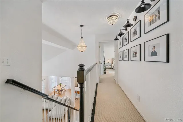 a view of a hallway with windows