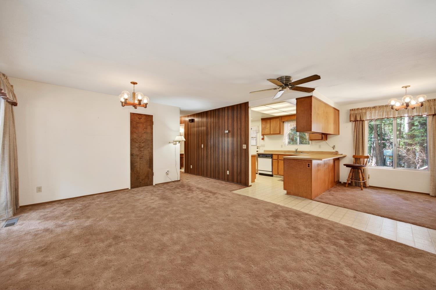 20191 Kit Court Volcano, CA 95689 - Photo 22 of 54 a view of a kitchen with a sink and dishwasher a refrigerator with wooden floor