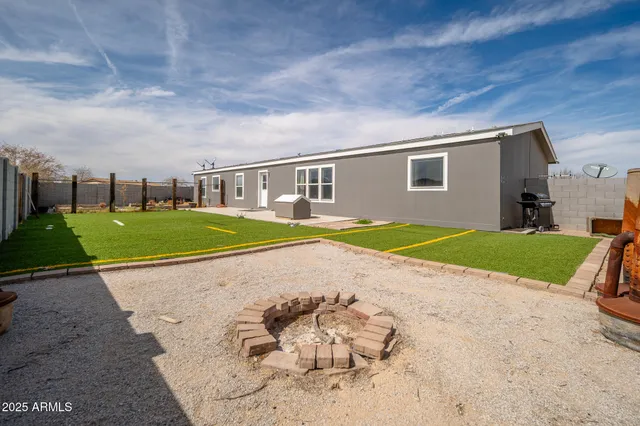 a view of a swimming pool with an outdoor space