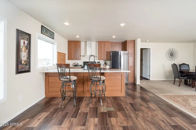 a cabinet with storage and utility room