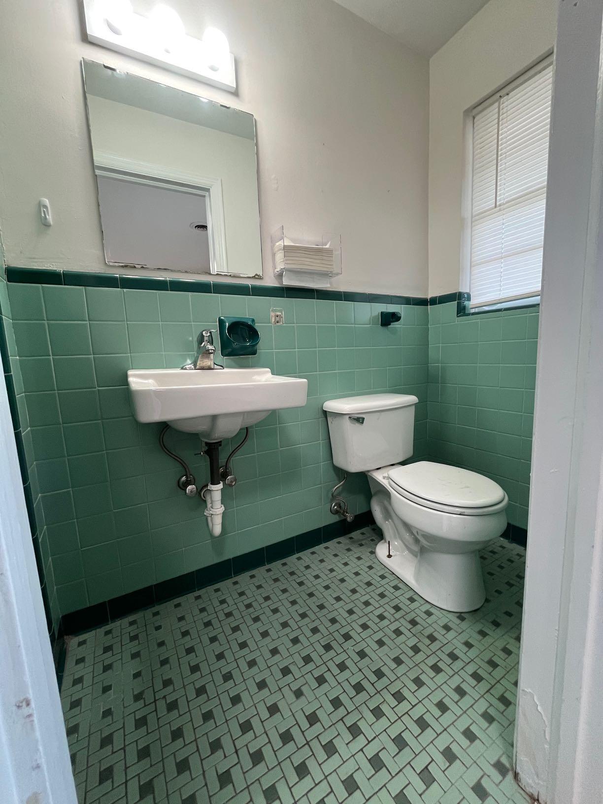 7629 Williamson Road, Unit 2 Roanoke, VA 24019 - Photo 4 of 5 a bathroom with a sink and a toilet