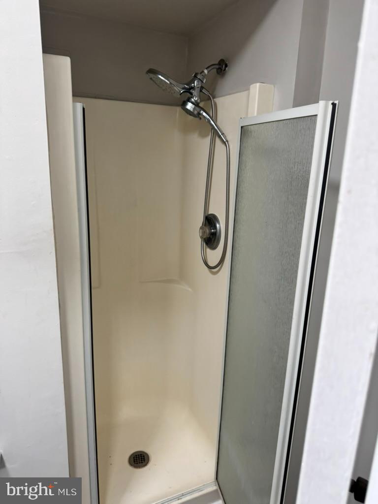 202-206 South Main Street Hatfield, PA 19440 - Photo 4 of 8 a bathroom with a shower and mirror