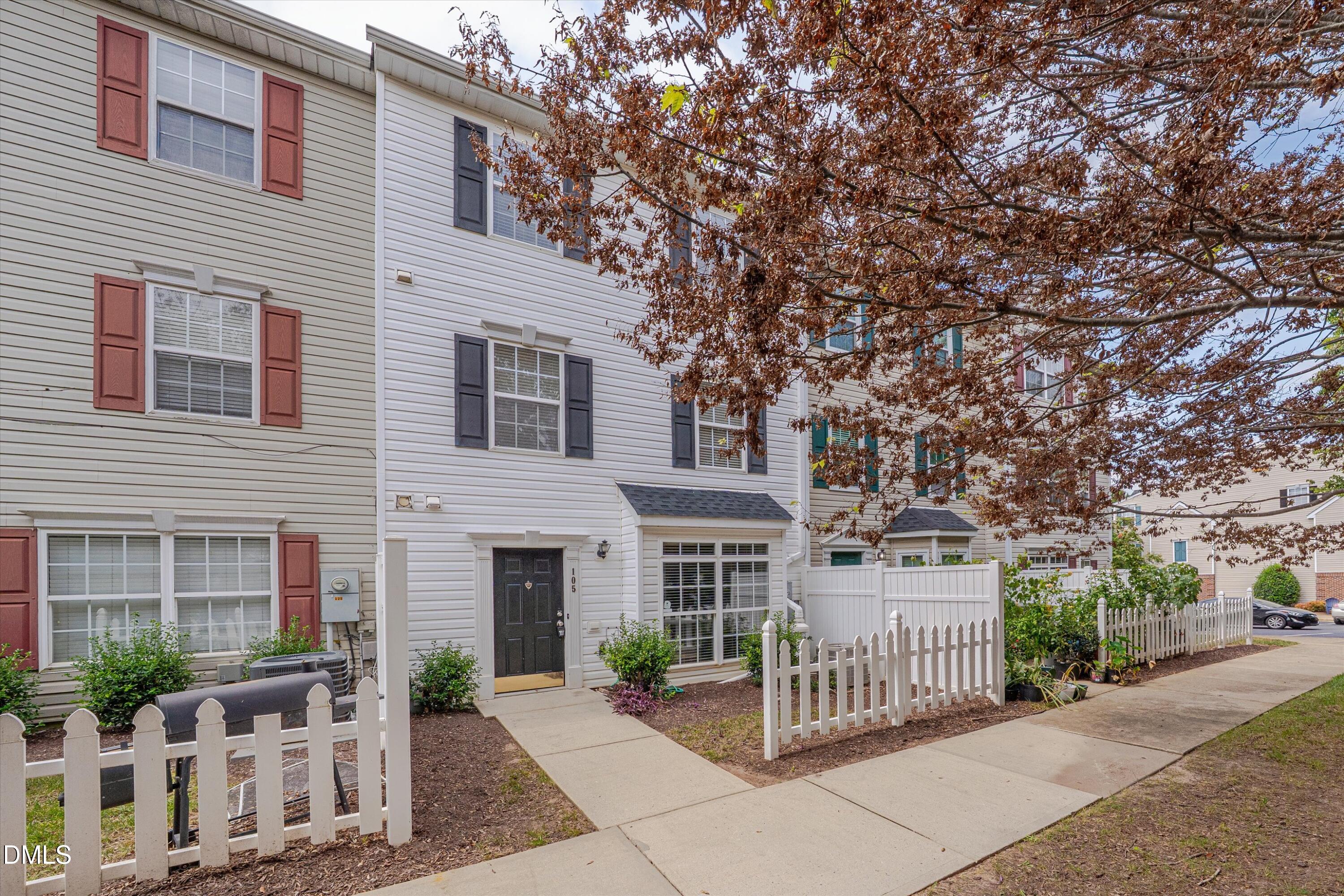 2621 Ivory Run Way, Unit 105 Raleigh, NC 27603 - Photo 2 of 21 front view of a house with a tree