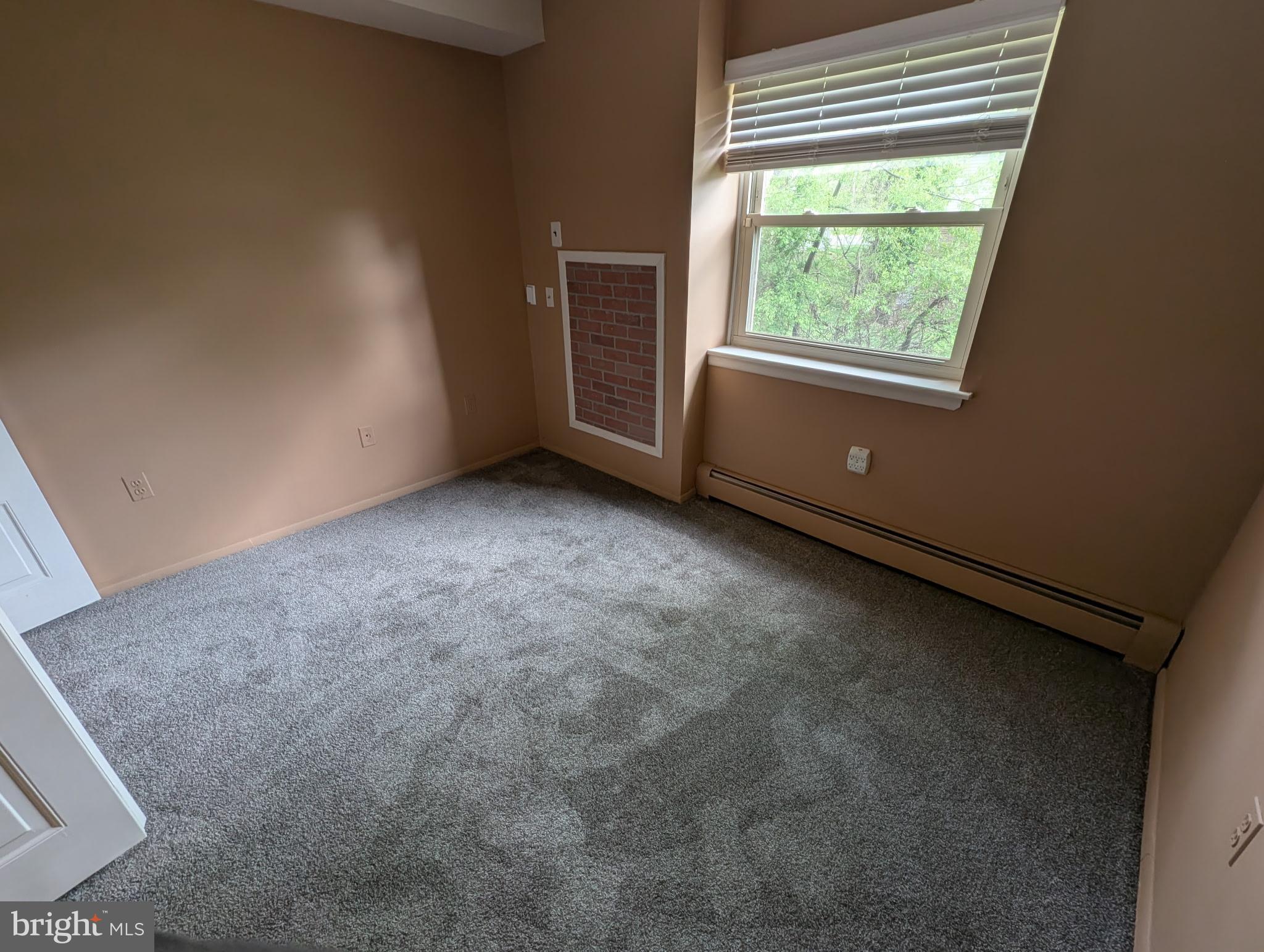 280 Bridgewater Road, Unit D1 Brookhaven, PA 19015 - Photo 12 of 15 an empty room with windows
