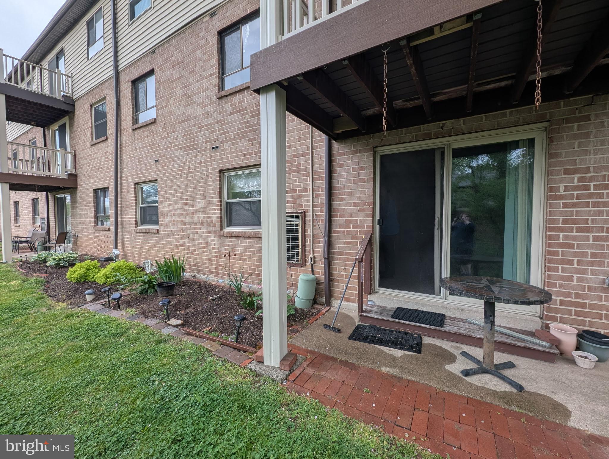 280 Bridgewater Road, Unit D1 Brookhaven, PA 19015 - Photo 15 of 15 a front view of a house with garden