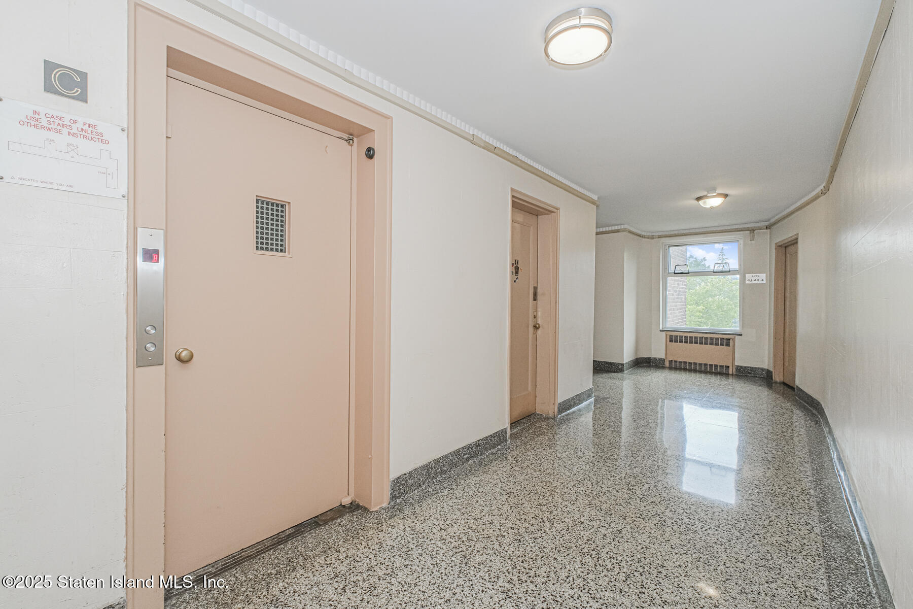 36 Dahill Road, Unit 4F Brooklyn, NY 11218 - Photo 21 of 25 a view of empty room with wooden floor