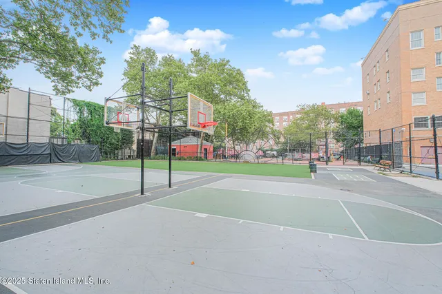 a view of a street with a building