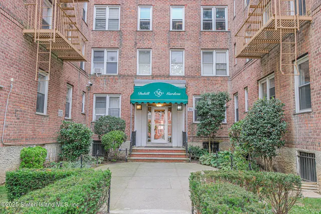 a front view of a multi story residential apartment building