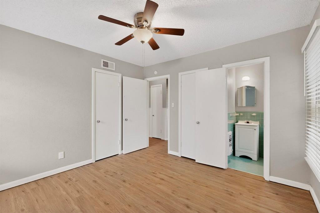 4508 Rutland Avenue Fort Worth, TX 76133 - Photo 30 of 36 a view of a livingroom with a ceiling fan & hardwood floor