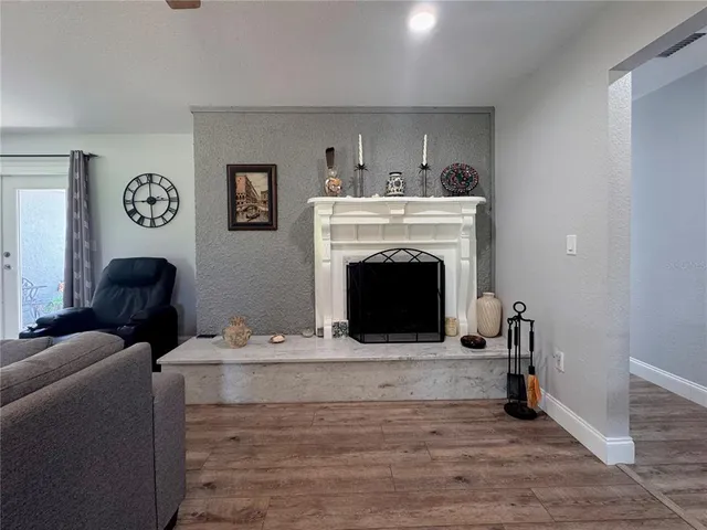 a view of a house with a yard and plants