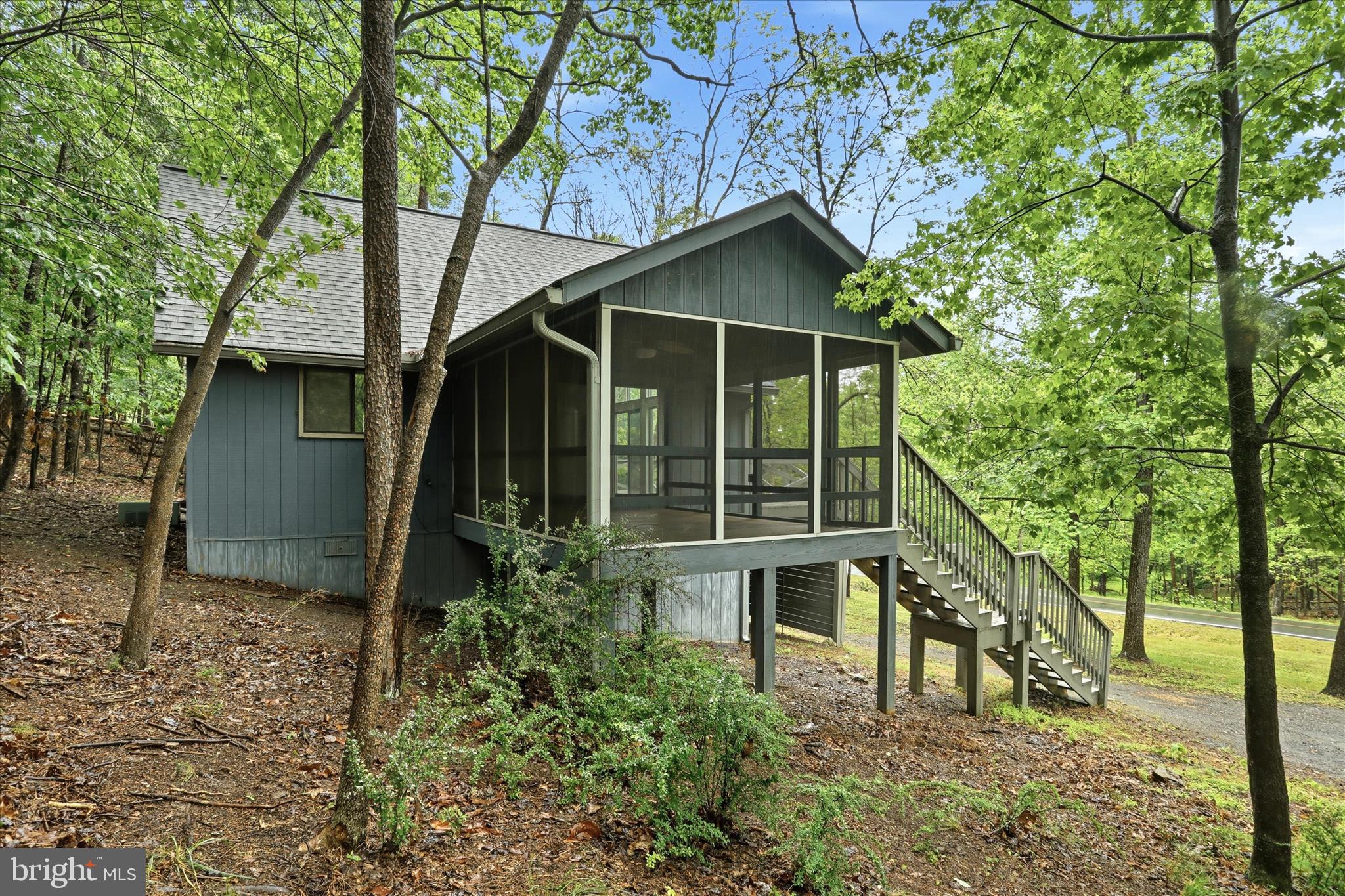 578 Walden Road Hedgesville, WV 25427 - Photo 38 of 39 a house with trees in the background