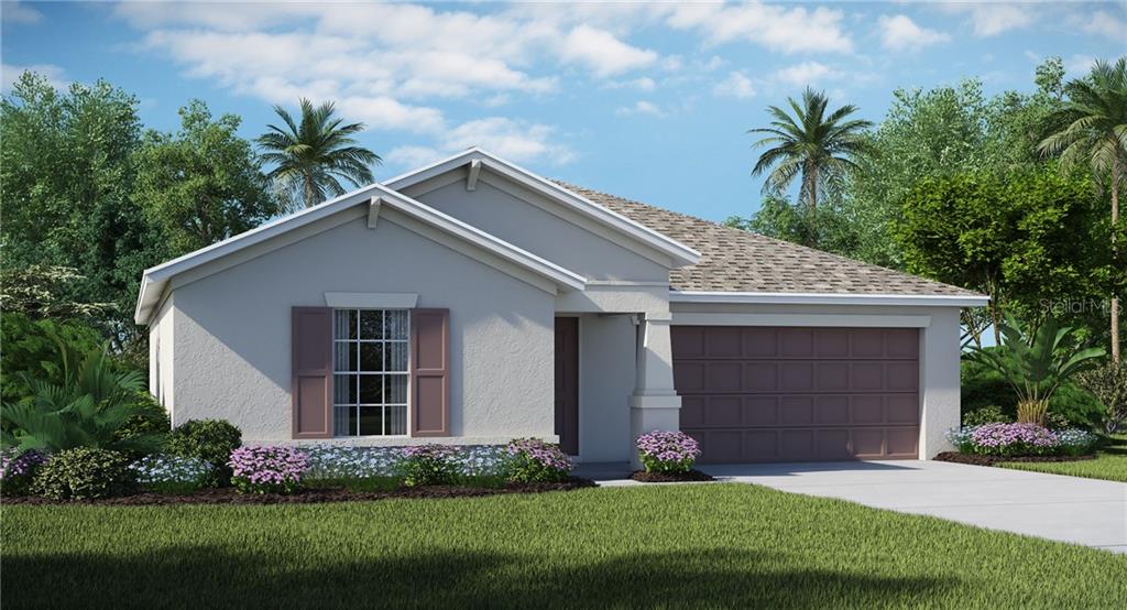 7045 Emerald Spring Loop New Port Richey, FL 34653 - Photo 1 of 1 a front view of house with yard and green space
