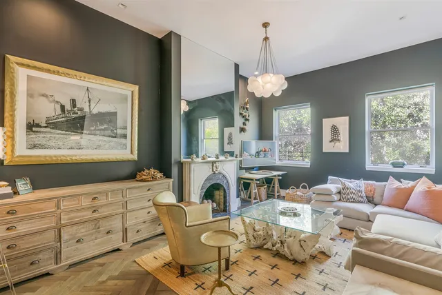 a kitchen that has a lot of cabinets in it