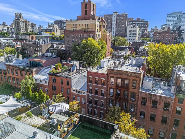a front view of building with outdoor seating