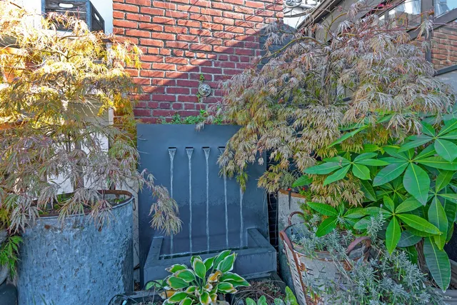 a view of a balcony with two chairs and a table