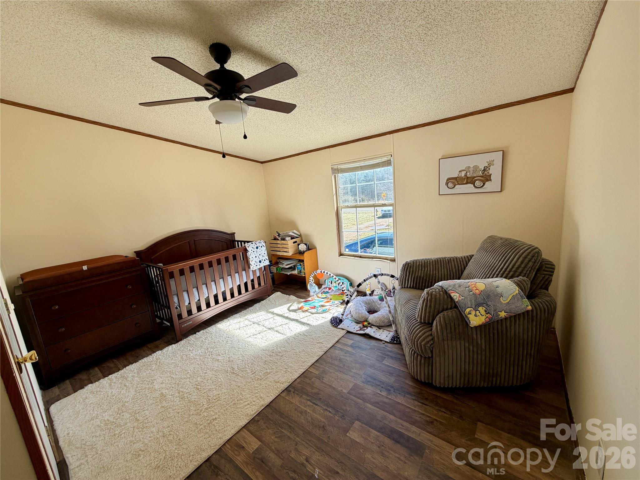 2390 Claremont Road Newton, NC 28658 - Photo 6 of 11 a living room with couches and furniture with wooden floor