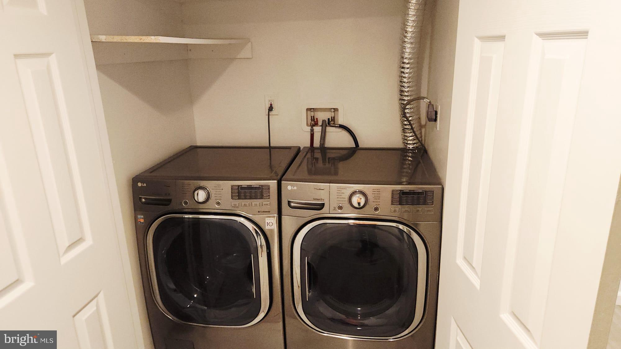 519 East 28th Street Baltimore, MD 21218 - Photo 15 of 46 Sleek laundry space with modern appliances.
