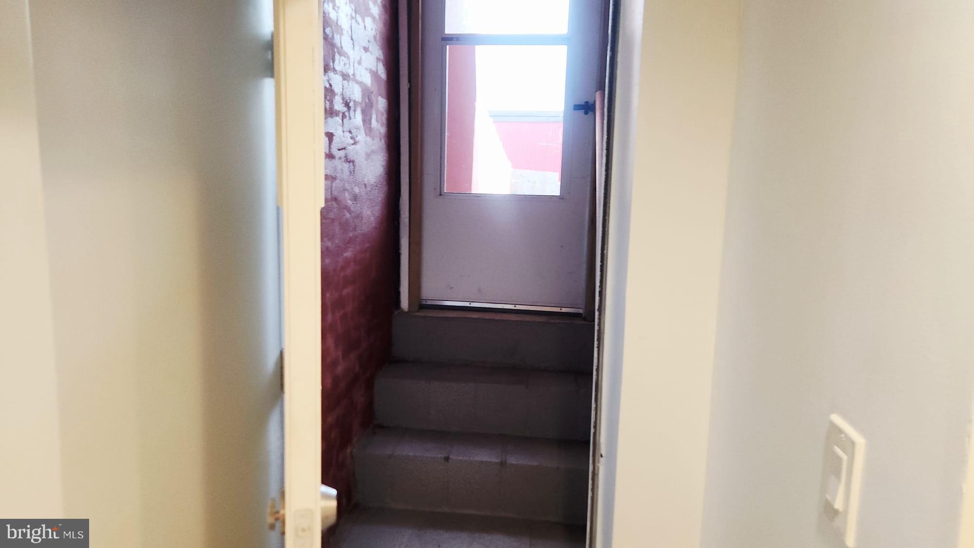 519 East 28th Street Baltimore, MD 21218 - Photo 21 of 46 Inviting entryway with a touch of charm.