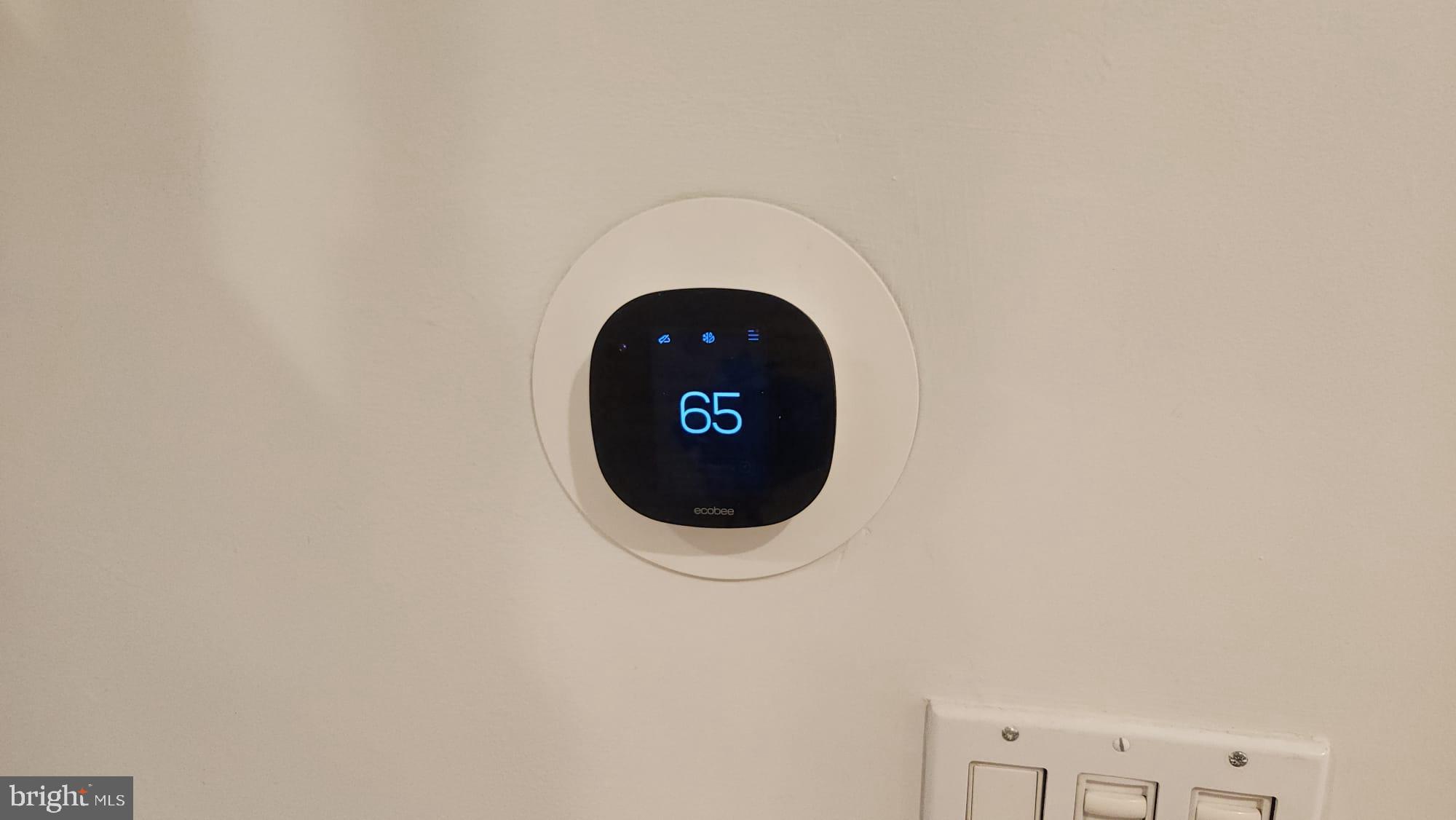 519 East 28th Street Baltimore, MD 21218 - Photo 24 of 46 Smart thermostat set to a cozy 65degF.
