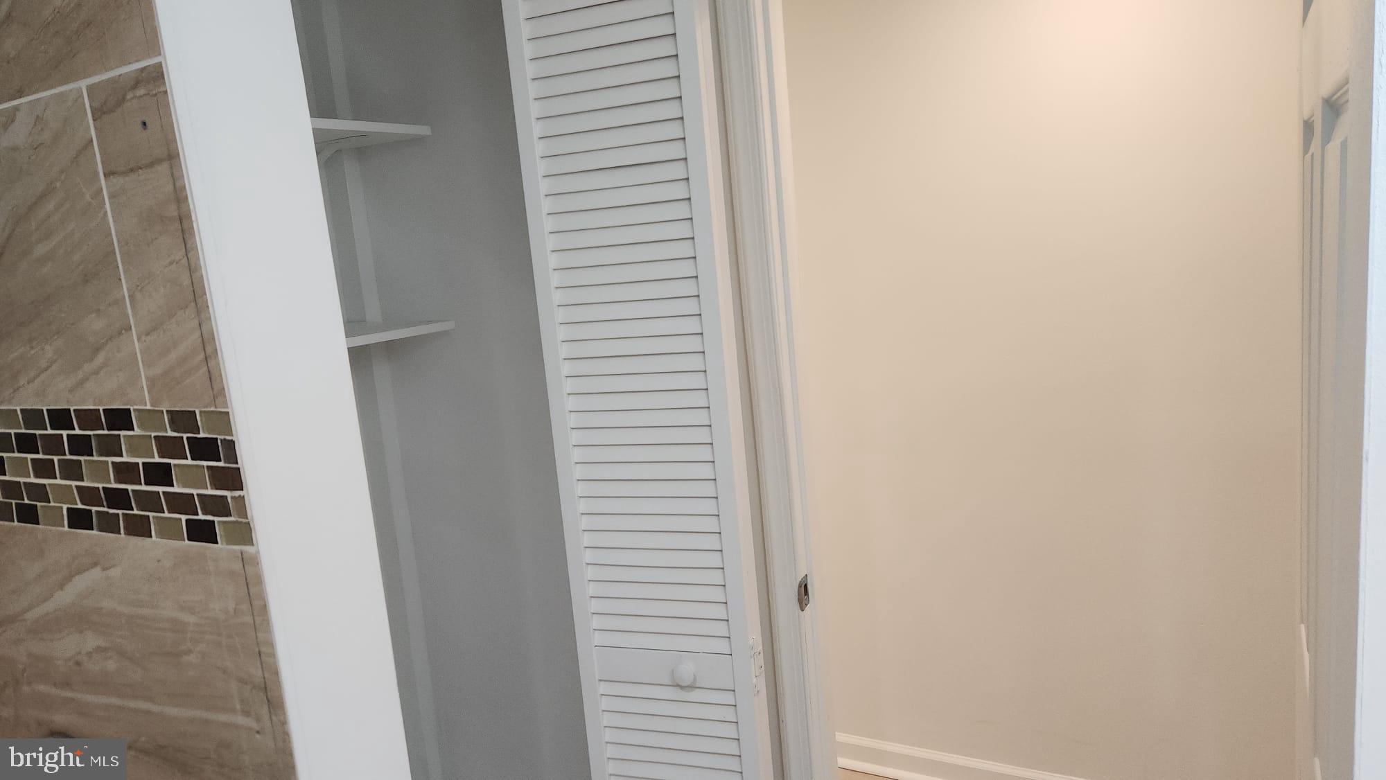 519 East 28th Street Baltimore, MD 21218 - Photo 32 of 46 Modern closet space with clean lines.