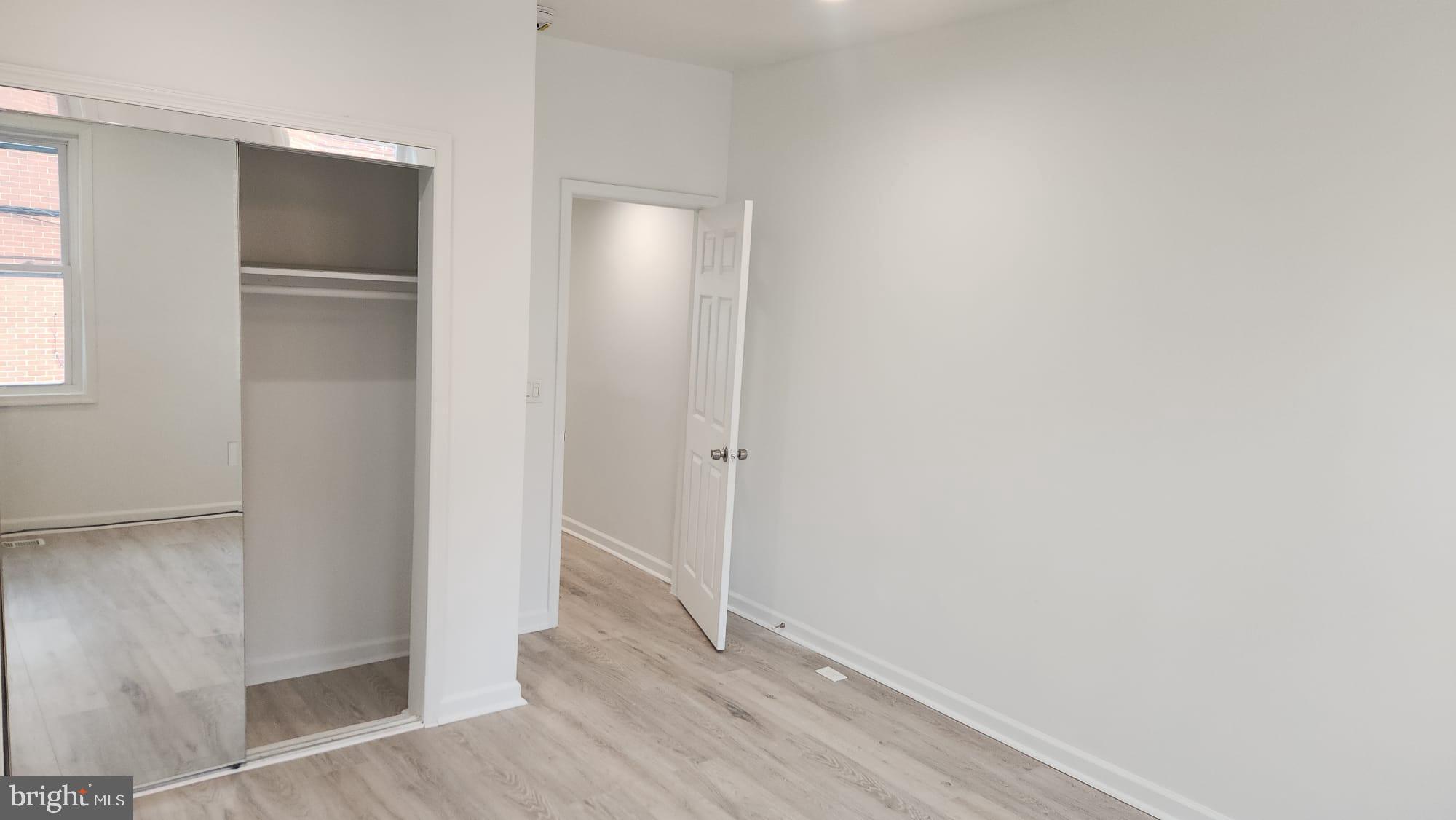 519 East 28th Street Baltimore, MD 21218 - Photo 37 of 46 Bright and airy room with modern finishes.