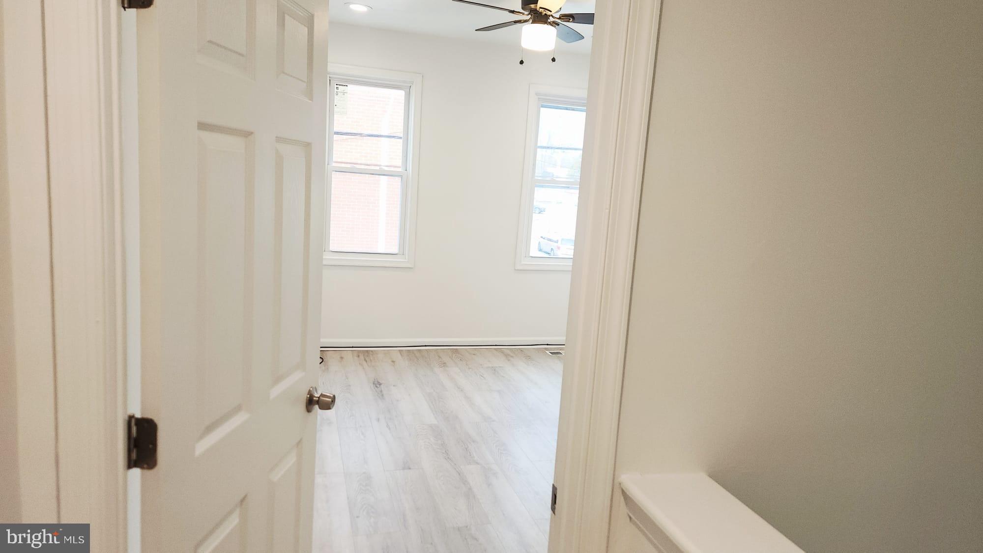 519 East 28th Street Baltimore, MD 21218 - Photo 40 of 46 Bright and airy entryway to a serene space.
