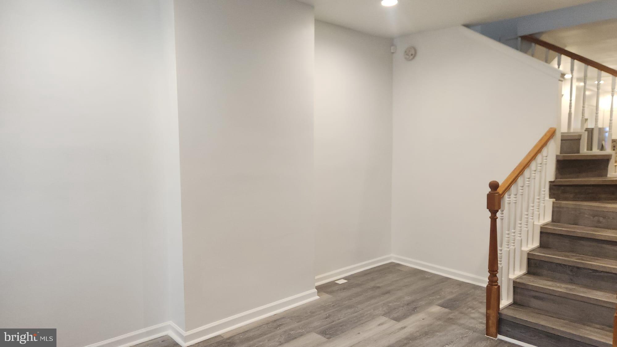 519 East 28th Street Baltimore, MD 21218 - Photo 4 of 46 Spacious entryway with modern charm.