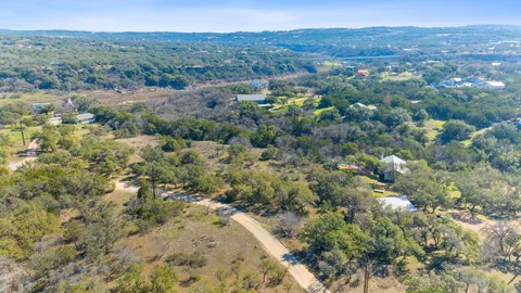 a view of a lake with a tree