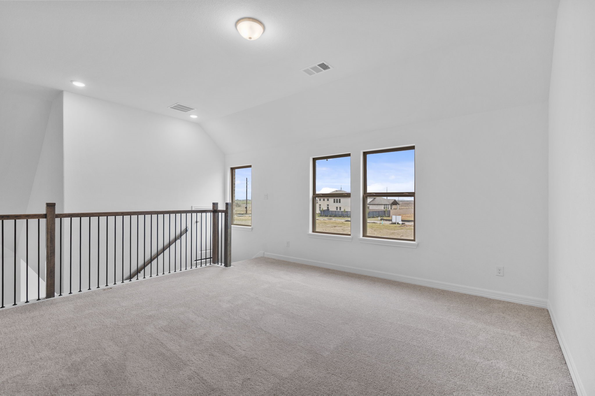 10639 Forward Street Richmond, TX 77469 - Photo 14 of 31 The loft offers an elevated retreat—perfect for movie nights, game days, or quiet moments between gatherings.