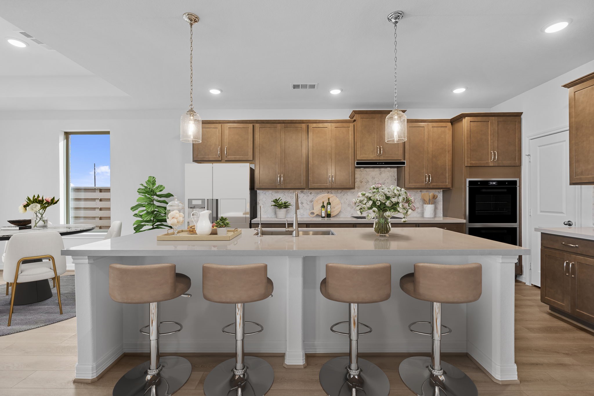 10639 Forward Street Richmond, TX 77469 - Photo 2 of 31 Kitchen featuring the AW Roosevelt Collection with traditional stained cabinetry, quartz countertops, and a tonal backsplash for a twist on old world charm..