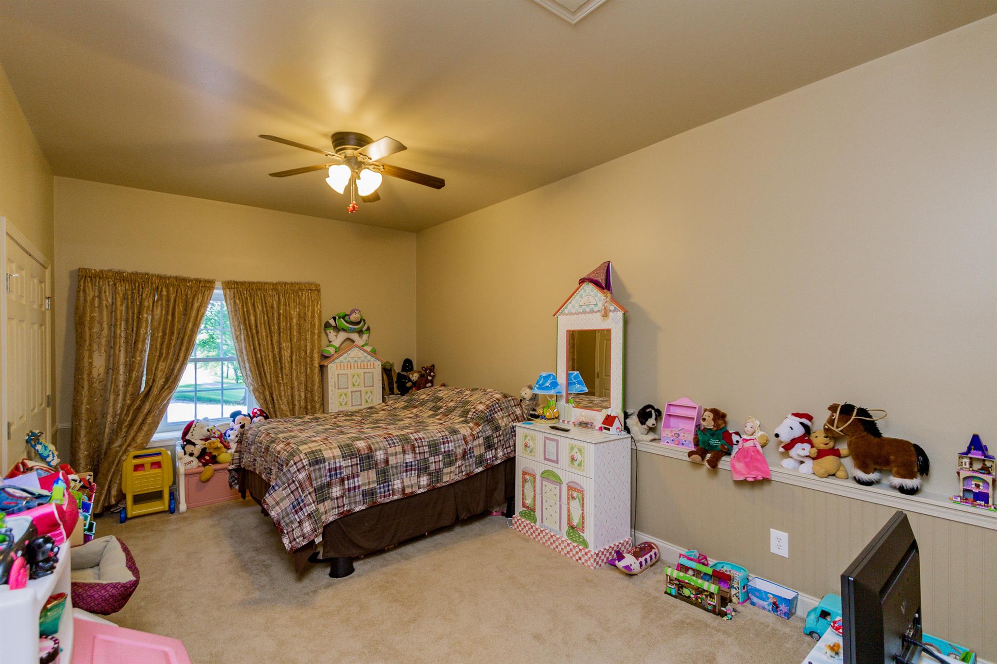 3701 Oakland Road Springfield, TN 37172 - Photo 13 of 22 a bedroom with a bed and a chandelier