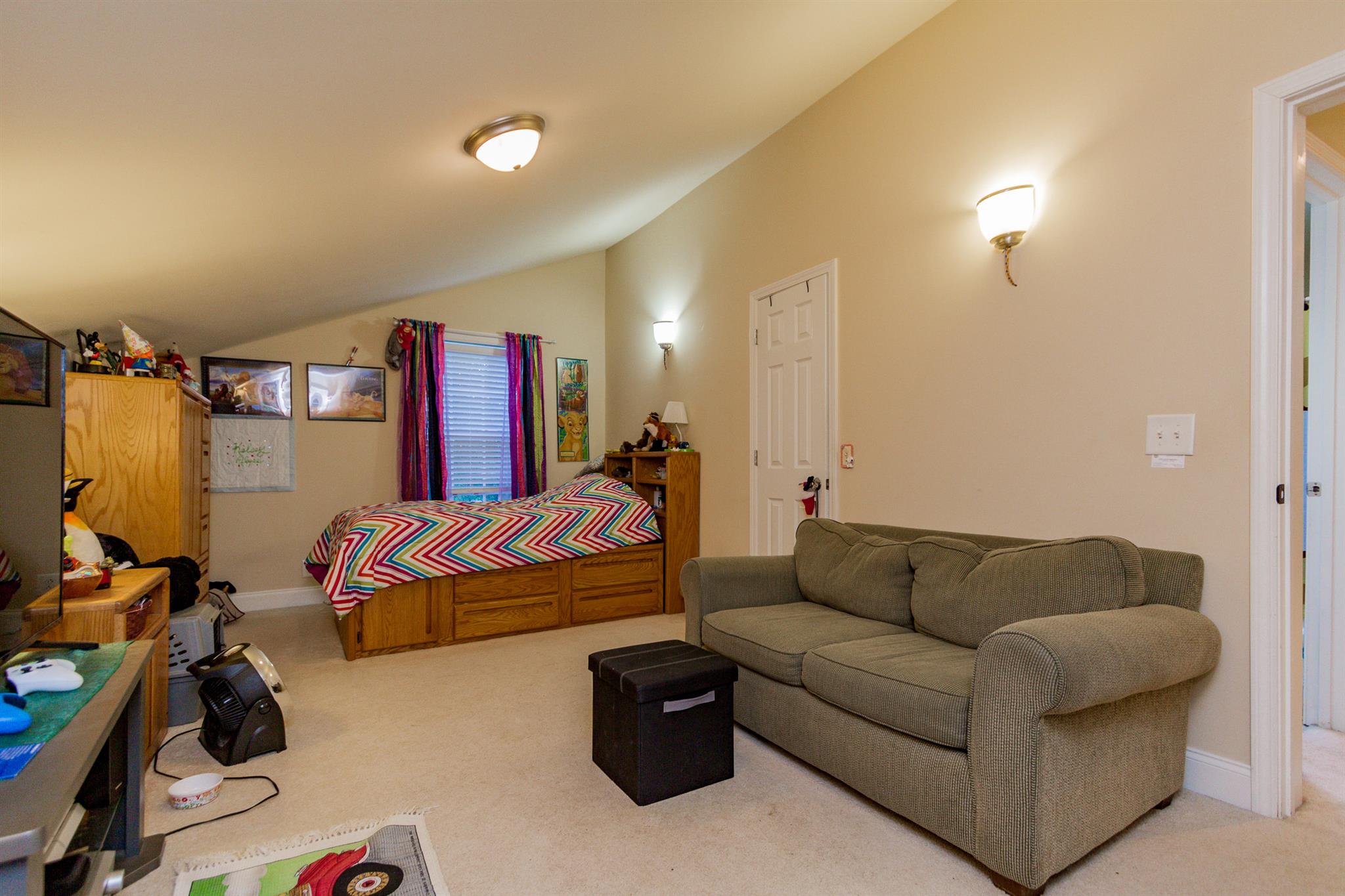 3701 Oakland Road Springfield, TN 37172 - Photo 14 of 22 a living room with furniture a bed and a flat screen tv