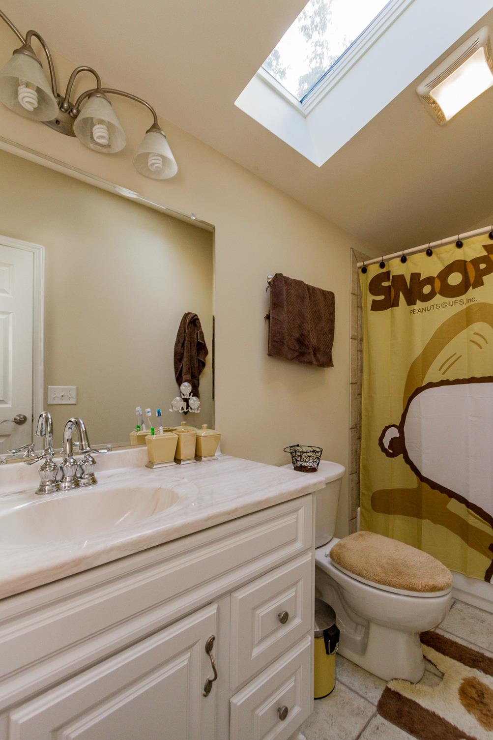 3701 Oakland Road Springfield, TN 37172 - Photo 15 of 22 a bathroom with a granite countertop toilet sink and mirror