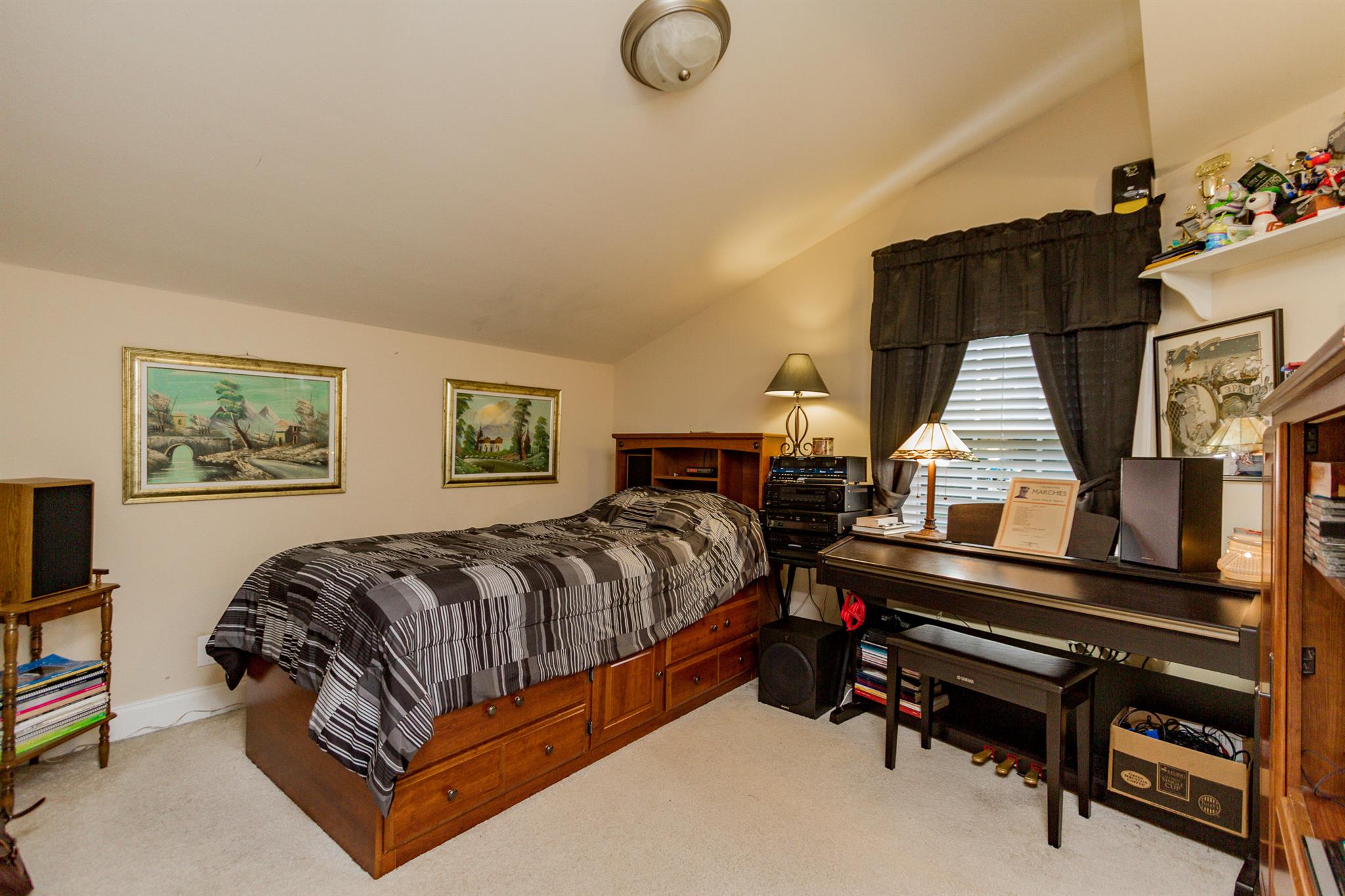 3701 Oakland Road Springfield, TN 37172 - Photo 17 of 22 a bedroom with a bed and wooden floor