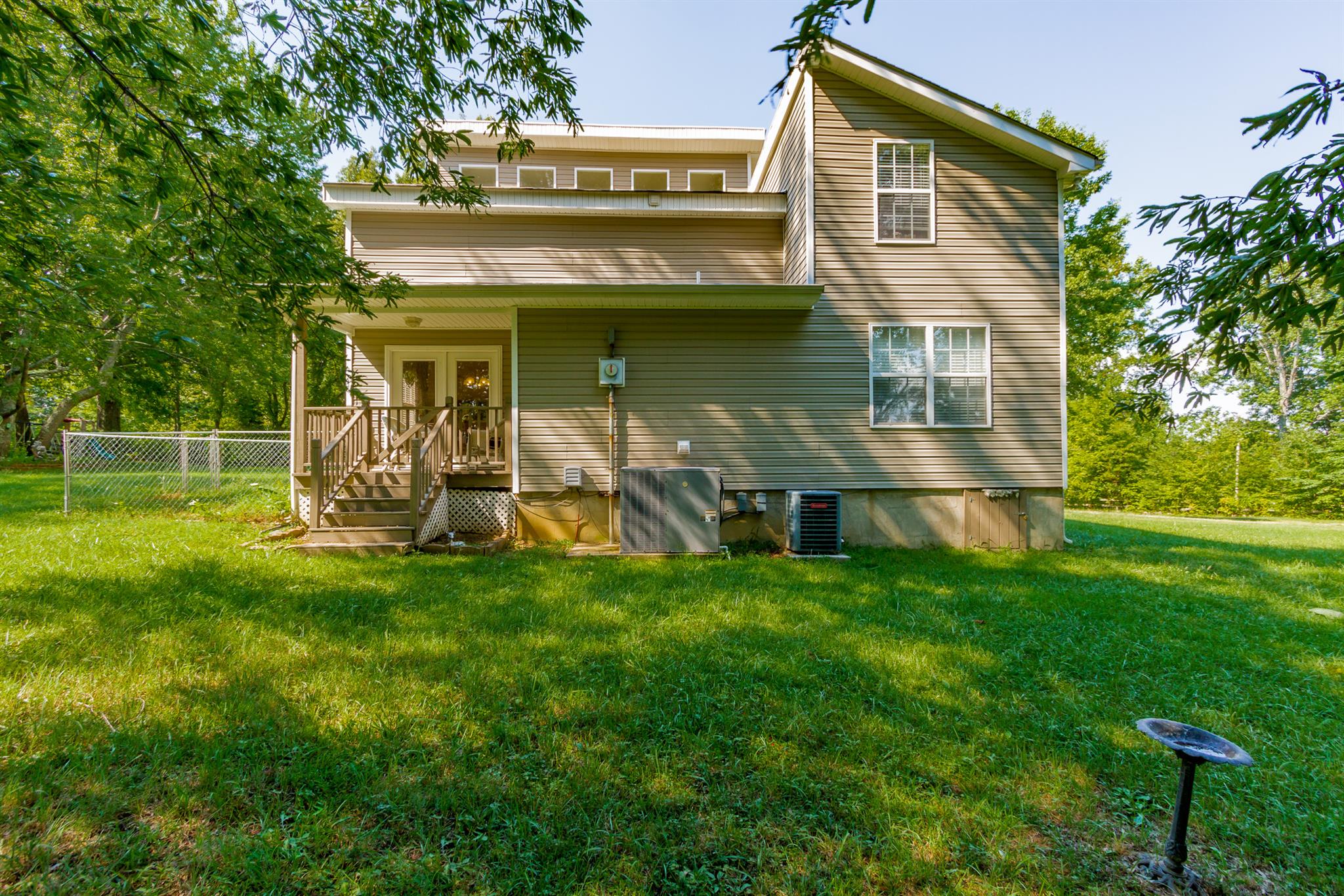 3701 Oakland Road Springfield, TN 37172 - Photo 20 of 22 a view of a house with a backyard