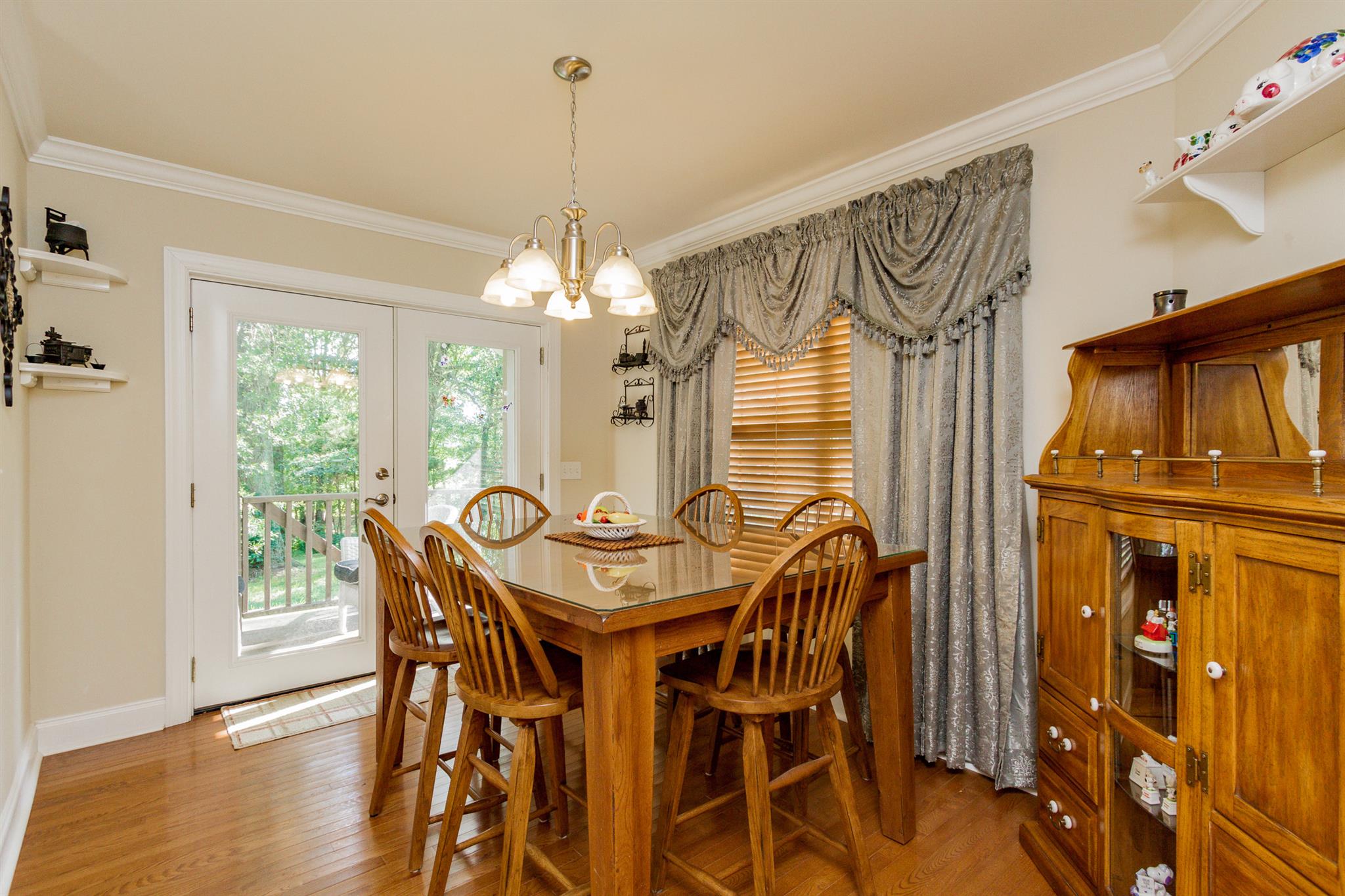3701 Oakland Road Springfield, TN 37172 - Photo 6 of 22 a view of a dining room with furniture window and wooden floor