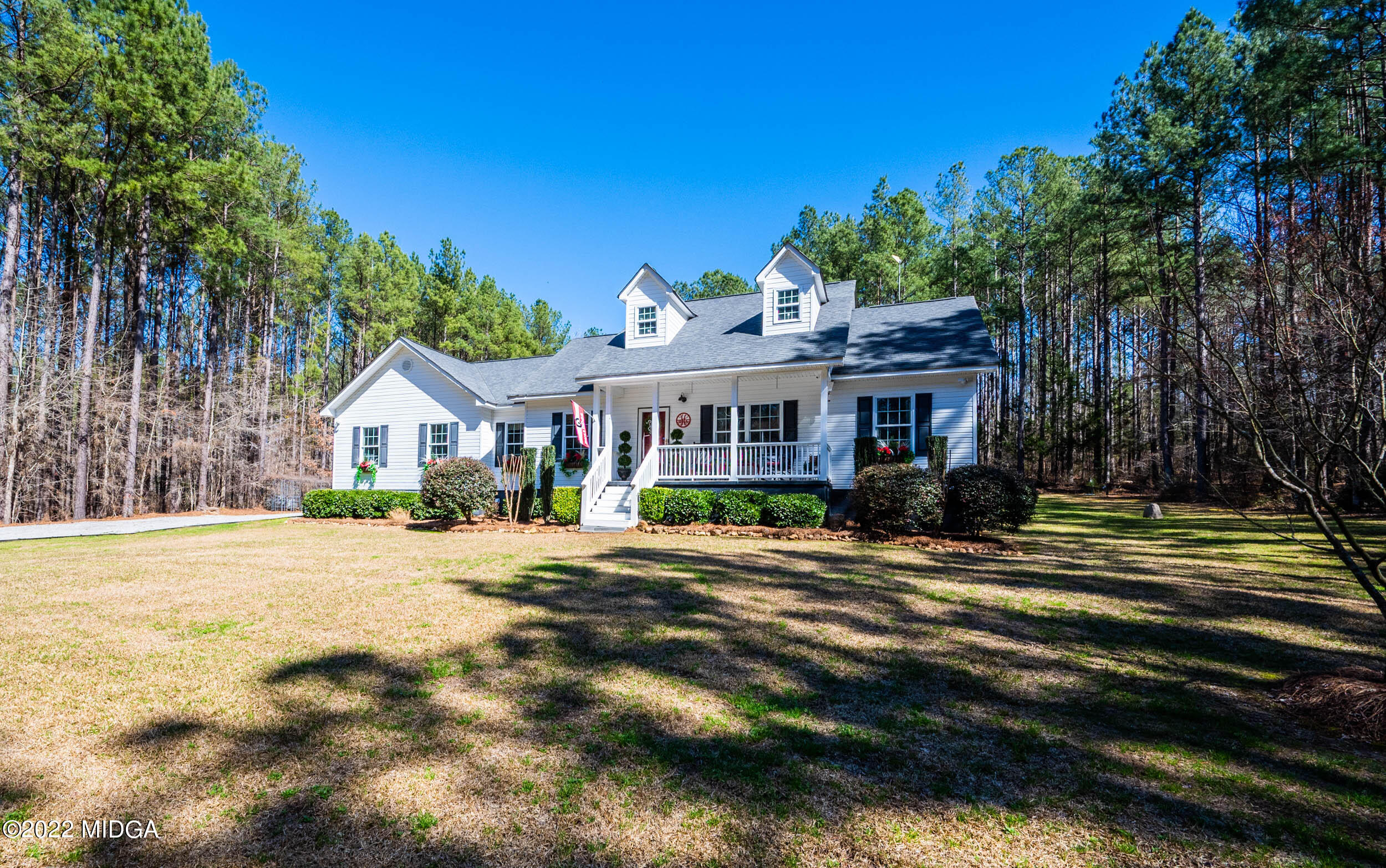 500 Gregory Road Forsyth, GA 31029 - Photo 2 of 47 a front view of a house with a yard