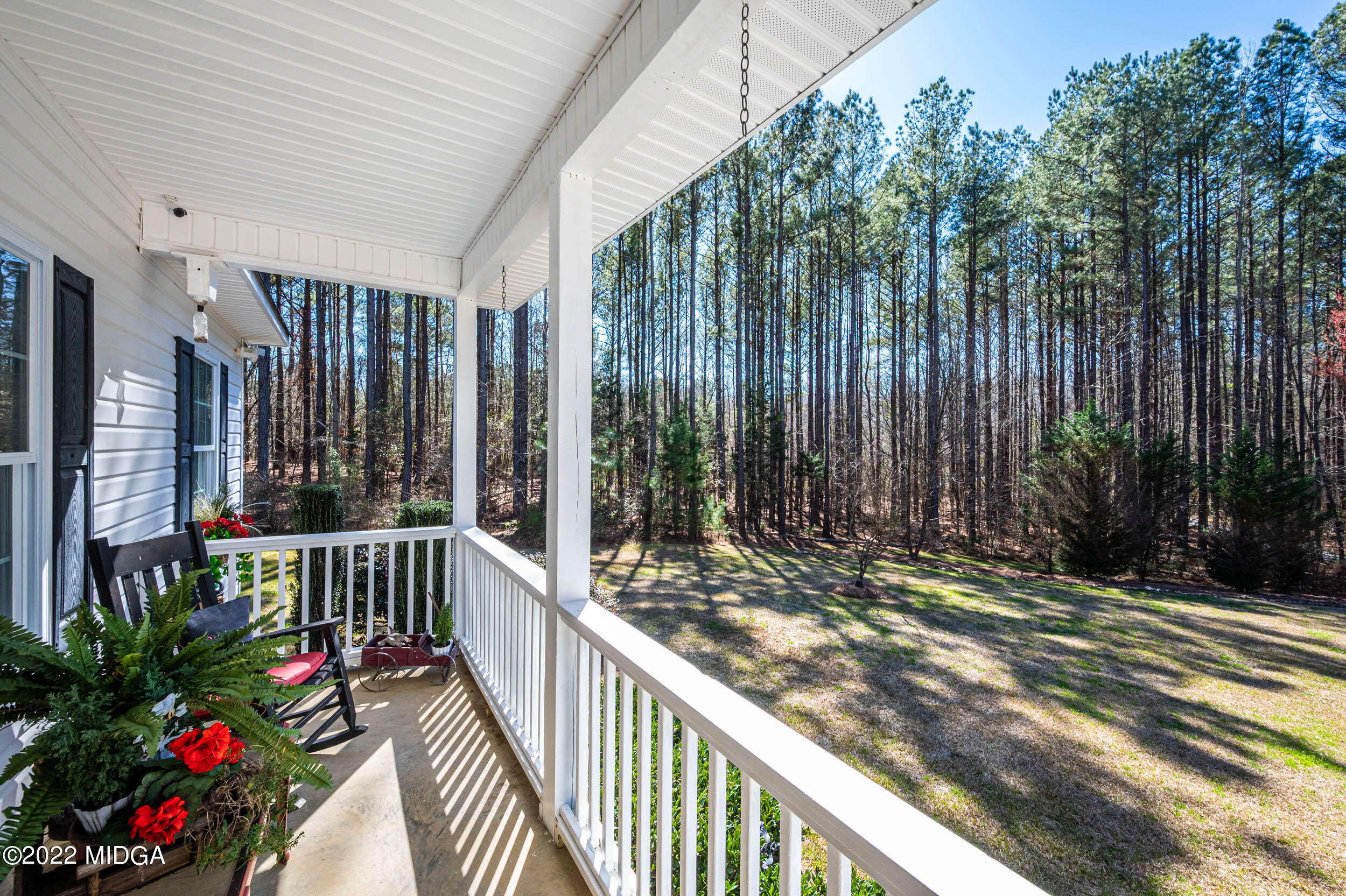 500 Gregory Road Forsyth, GA 31029 - Photo 42 of 47 a view of balcony with wooden floor and outdoor space