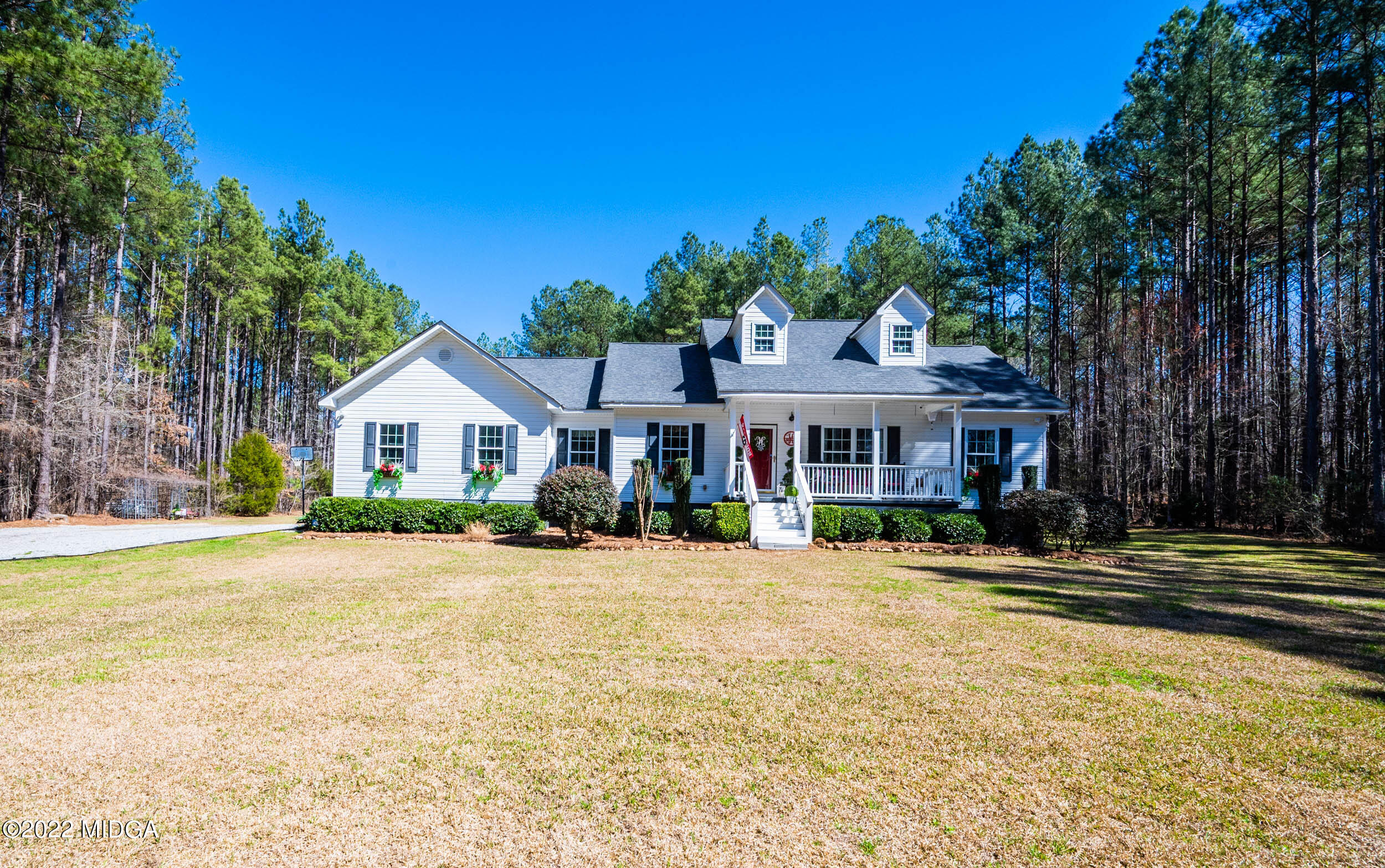 500 Gregory Road Forsyth, GA 31029 - Photo 44 of 47 a front view of a house with a yard and garage