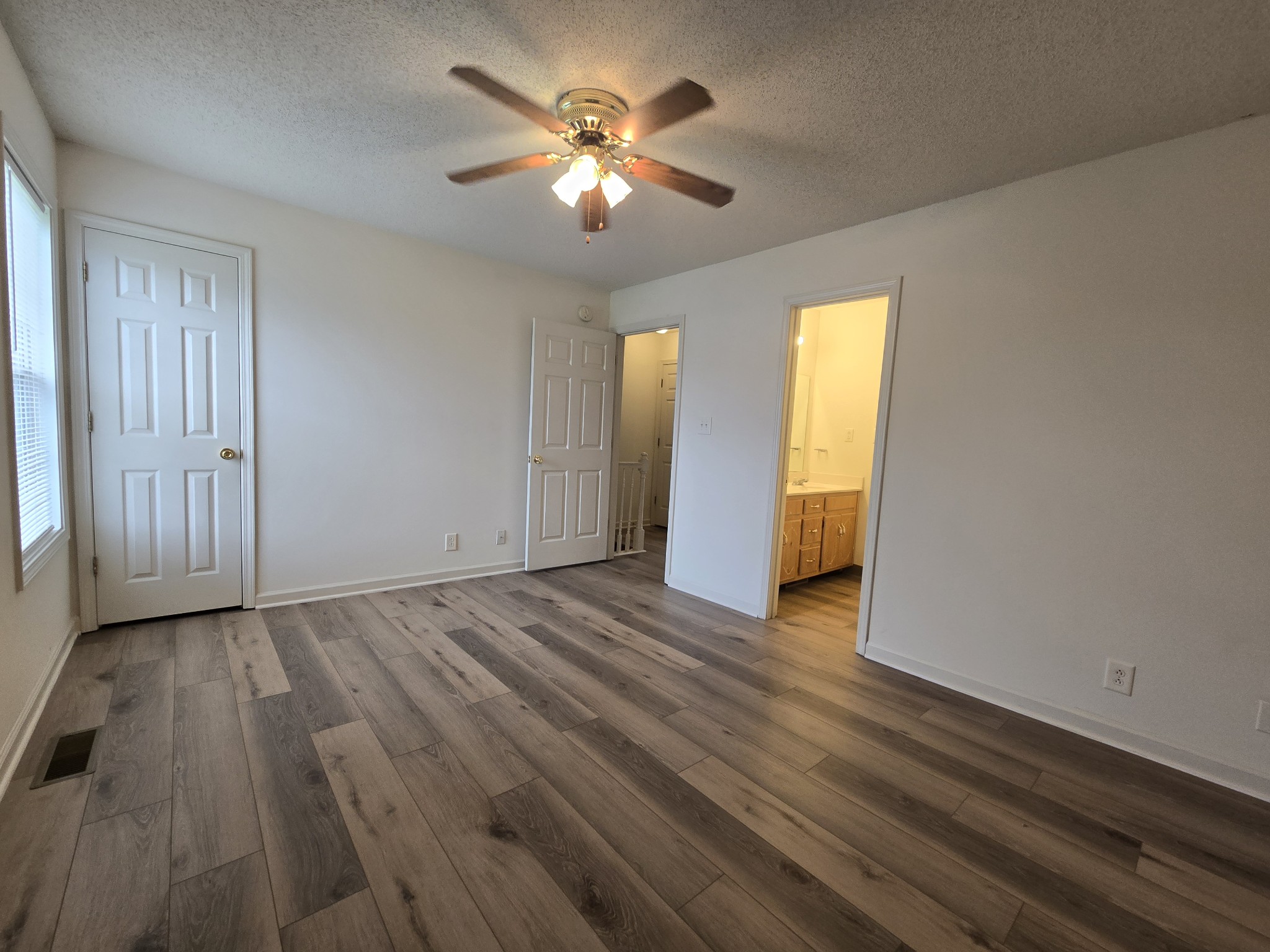 237 State Line Road Oak Grove, KY 42262 - Photo 19 of 20 wooden floor in an empty room with a window