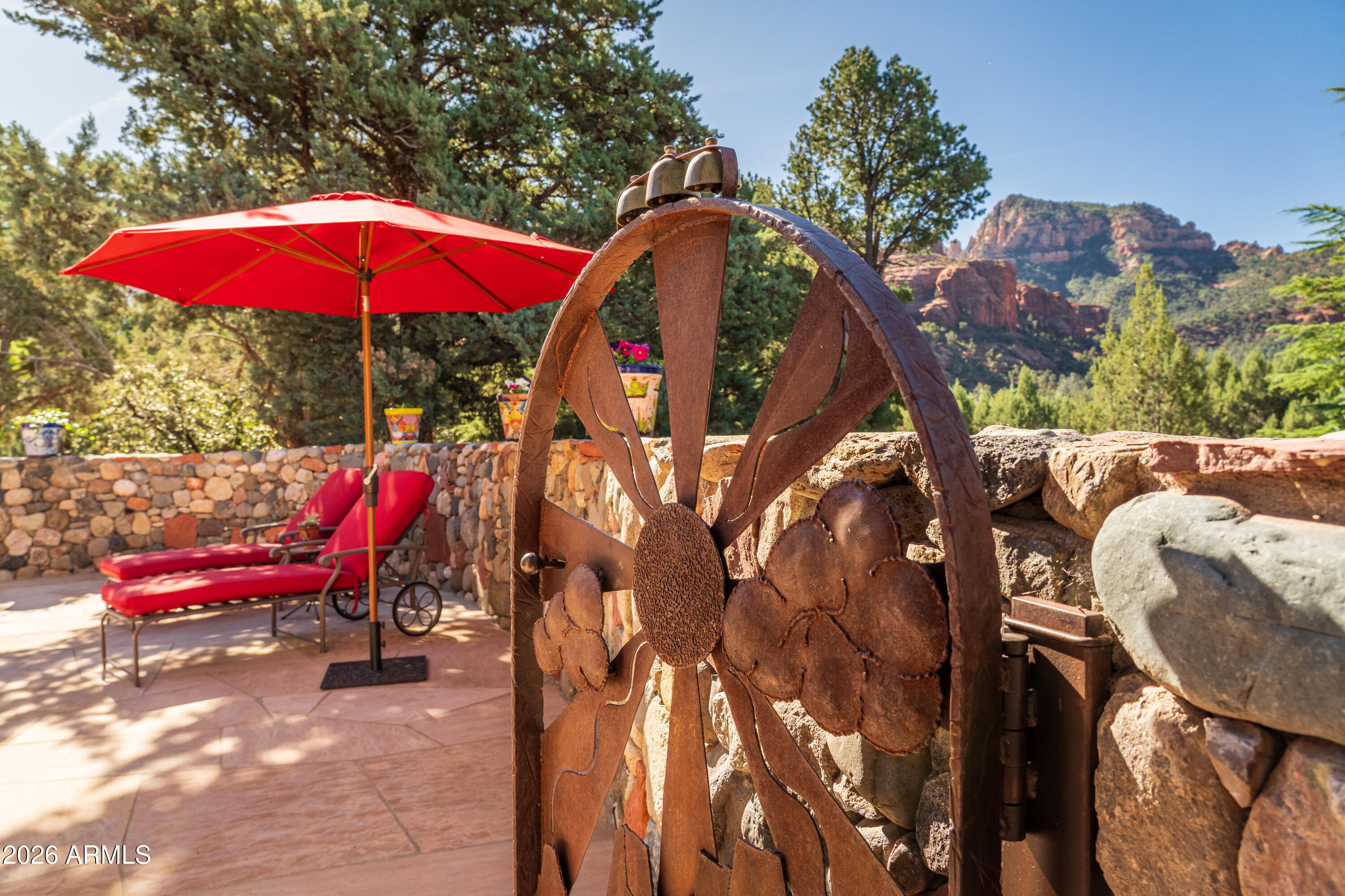 190 Morgan Road Sedona, AZ 86336 - Photo 14 of 51 an outdoor sitting area with furniture and wooden deck
