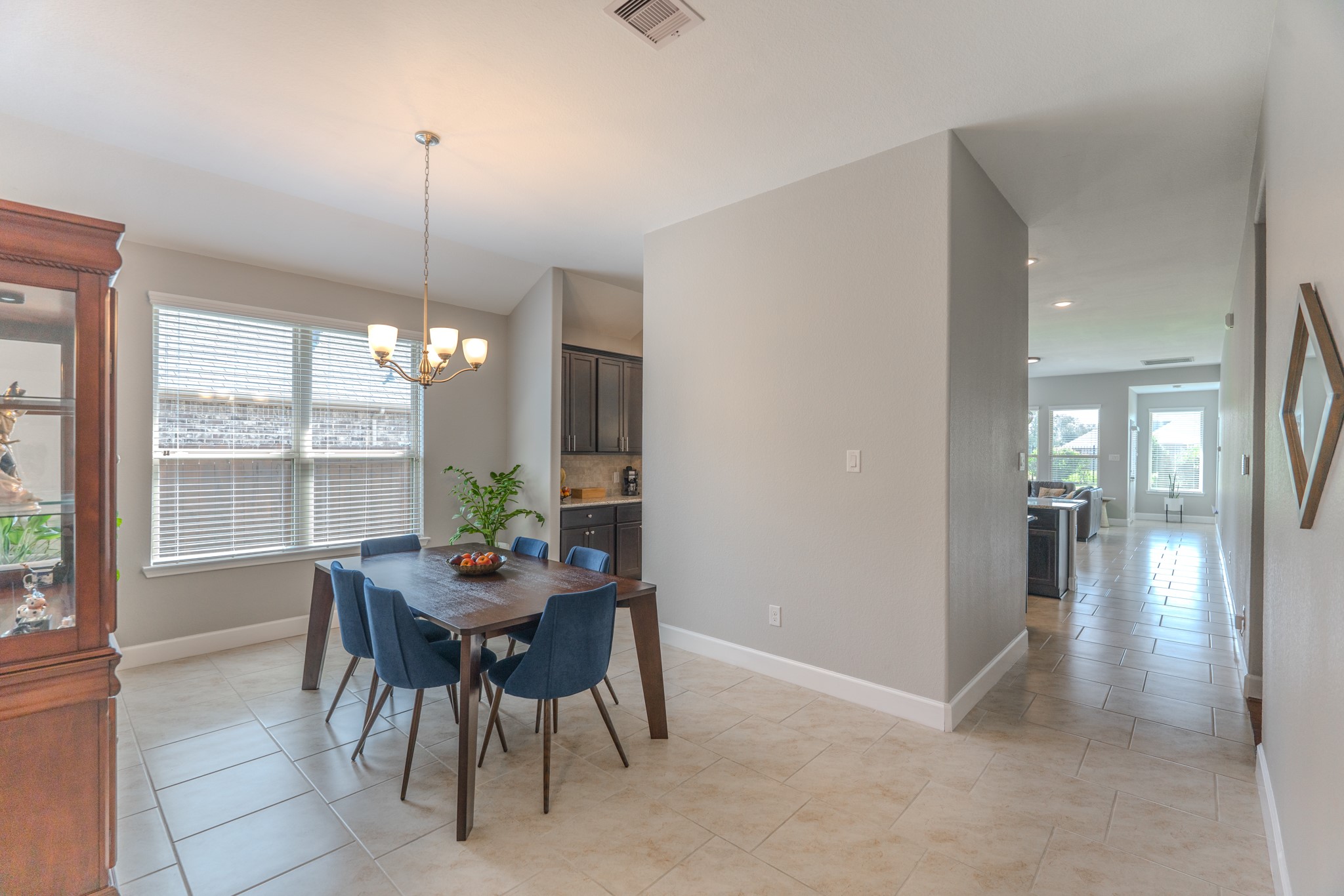 24322 North Newcastle Bay Trail Spring, TX 77389 - Photo 10 of 50 a dining room with furniture and window