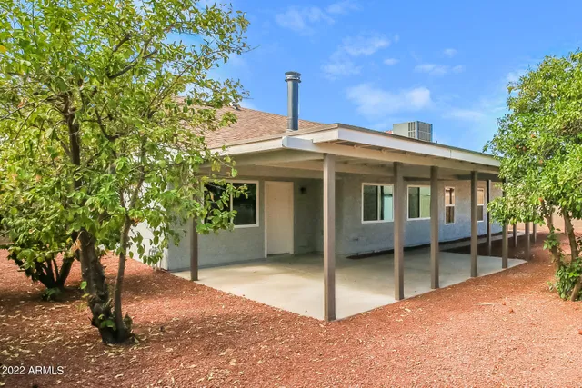 a front view of a house with a porch