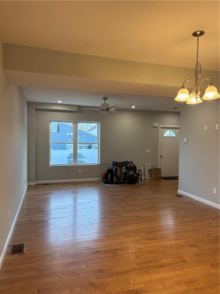 184 Avenue C, Unit M3 Woonsocket, RI 02895 - Photo 3 of 10 Spacious living and dining area with beautiful hardwood floors.