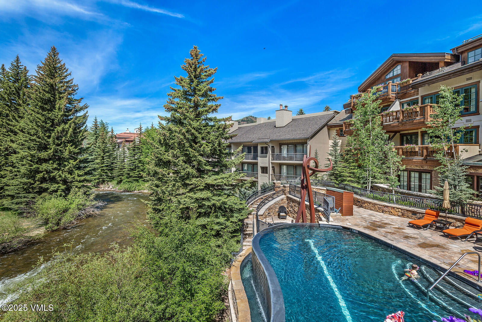 1 Willow Bridge Road, Unit 34 Vail, CO 81657 - Photo 15 of 27 Infinity Pool on Gore Creek
